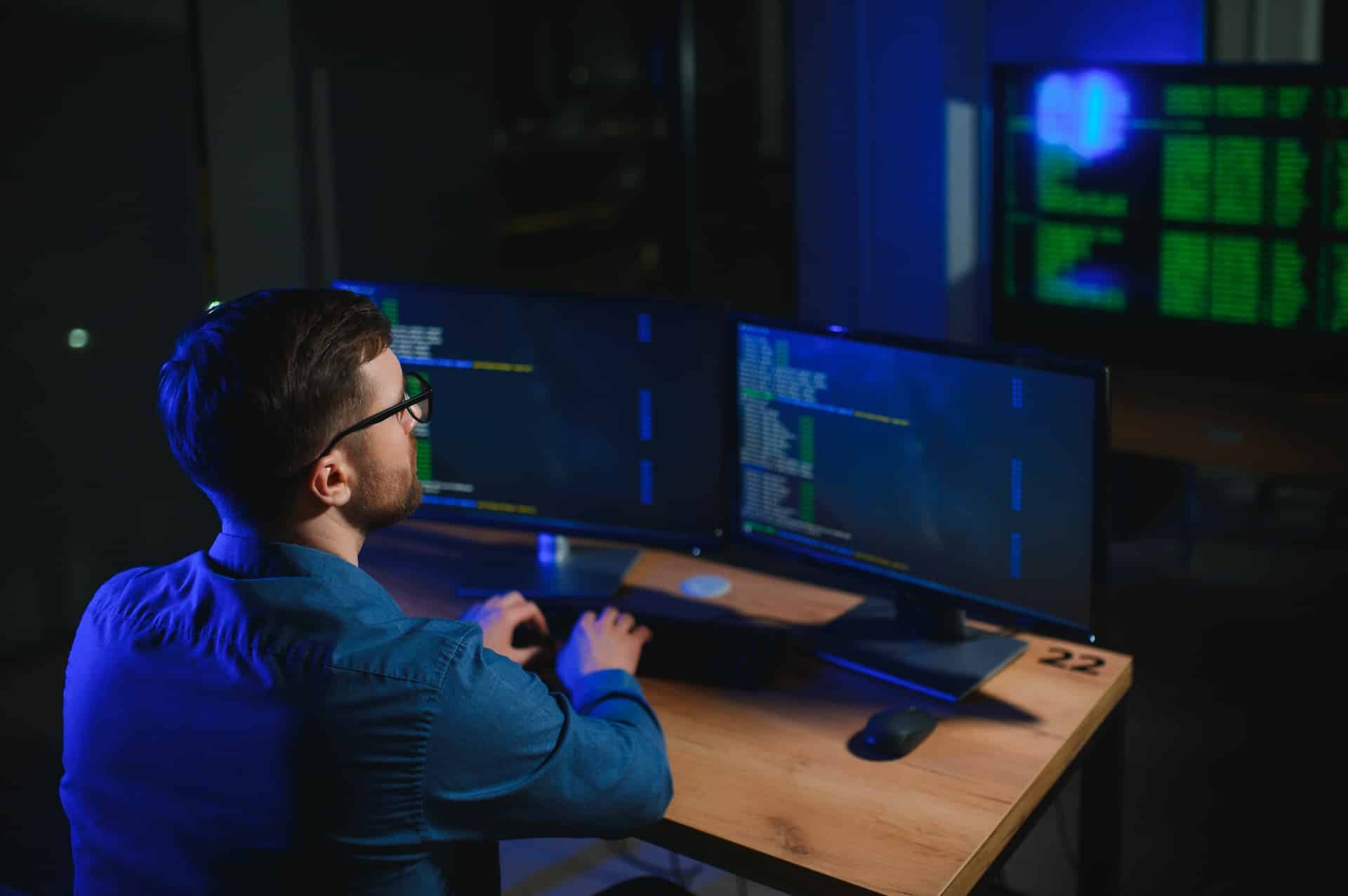 IT technician person with technology for typing code, future and data analytics.