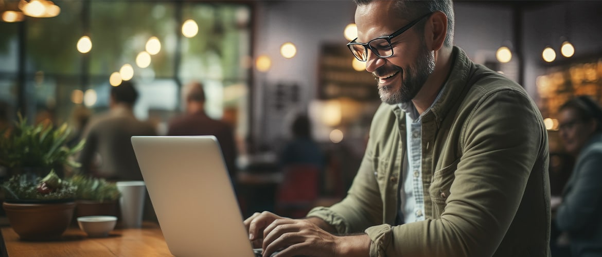 Man with glasses working remotely