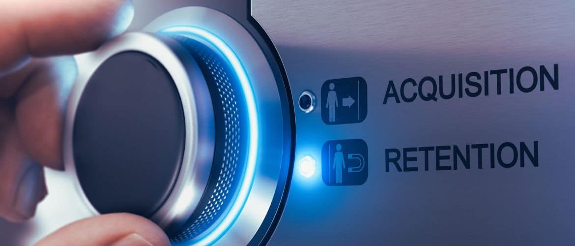 Close-up of a hand turning a knob with glowing blue lights. The panel displays icons representing customer acquisition and retention, symbolizing the role of instant support in enhancing customer loyalty and retention. The image highlights the importance of effective customer service in driving business growth.
